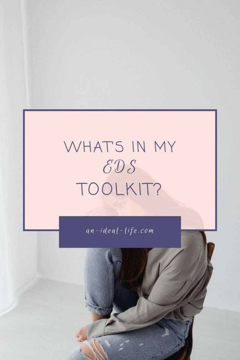 A seated person is partially visible behind a pale pink text box outlined in purple. Text reads “WHAT’S IN MY EDS TOOLKIT?” with “an-ideal-life.com” below.